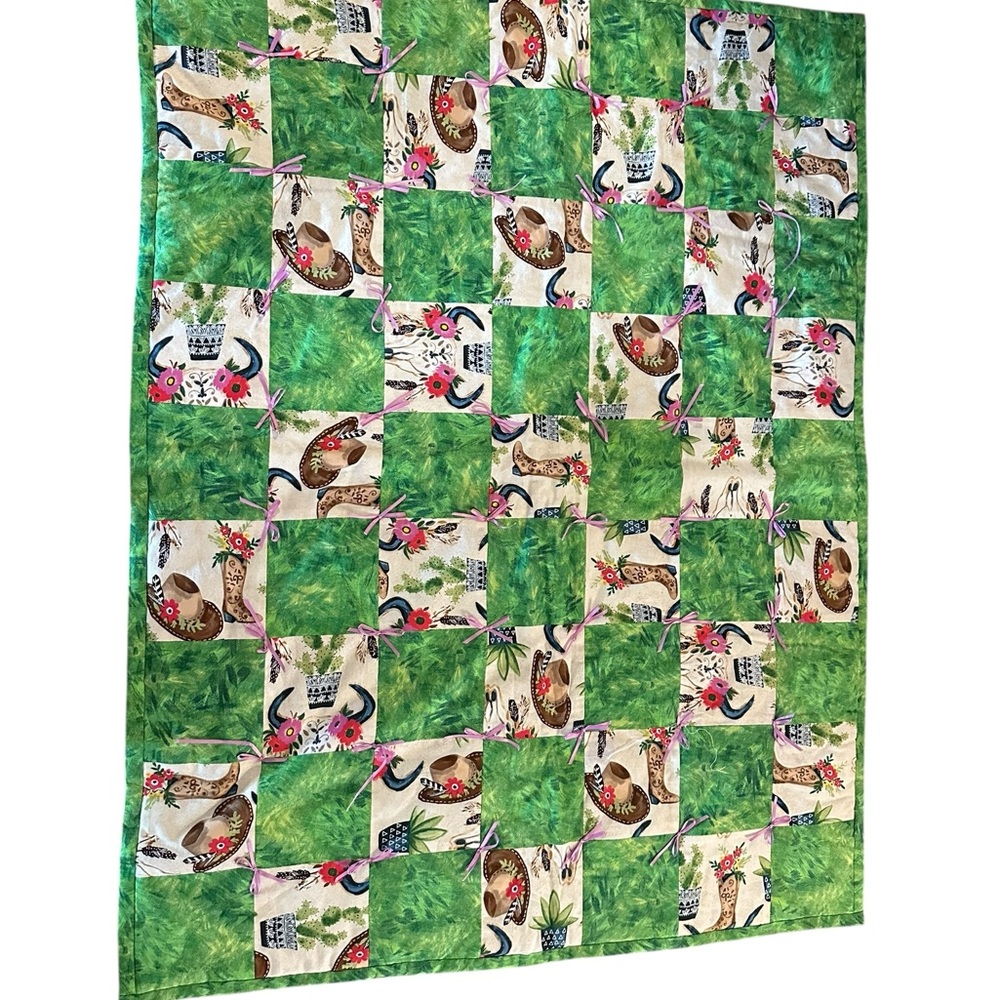 Green and Cream Patchwork Quilt with Western Motif
